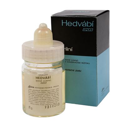 Fili di seta sterilizzati in un barattolo da 20 g in soluzione conservante