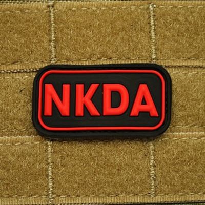 Toppa KREV NKDA plastica NERO/ROSSO