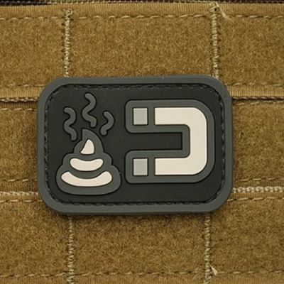 Toppa SHIT MAGNET plastica NERA